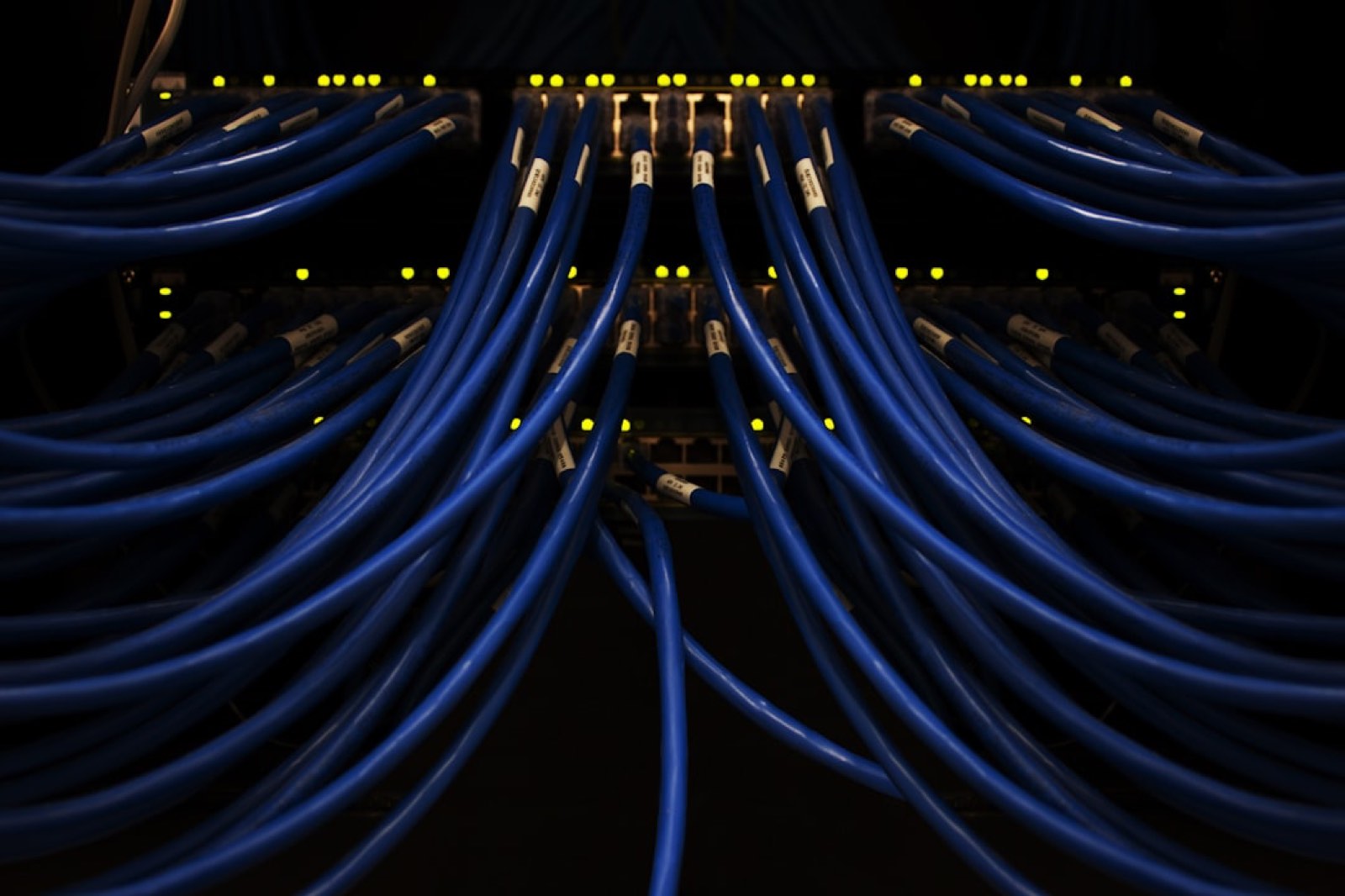 Network cabling in a data centre, representing integration rails